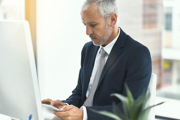 Canvas Print - Mature man, office and browsing tablet for internet research, online and information as lawyer. Entrepreneur, desk and computer for connection, networking and legal advice or company growth as ceo