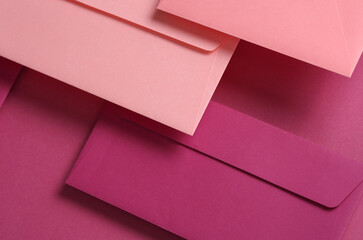 Wall Mural - Set of floating pink tones envelopes and cards on pink  background. Invitations, corporate identification