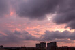 Dramatic colorful pink and purple sunset clouds and sky over San Antonio Texas