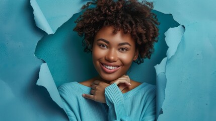 Poster - Woman Breaking Through Blue Paper