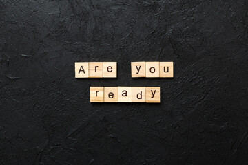 Wall Mural - Are You Ready word written on wood block. Are You Ready text on table, concept