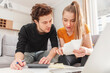 © Proxima Studio - Worried young Caucasian couple going over bills