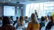 © Best - Attendees in the seminar room lean in, captivated by the presenter's words, cultivating an environment of mutual learning and professional development.