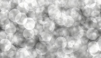 Wall Mural - Artistic abstract grey bokeh lights in defocused blurred background for design projects