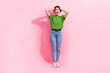 Full body portrait of speechless shocked lady arms touch head open mouth isolated on pink color background