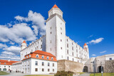 Fototapeta Londyn - Bratislava Castle or Bratislavsky Hrad in Bratislava, capital city of Slovakia during spring day. Bratislava Castle is on hill above the Danube river.