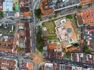 George Town, Malaysia: Aerial top down view of the historic George Town UNESCO city center with the Kapitan Keling Mosque in Penang island.