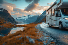 Motor Home Rides On The Road Among The Mountains And Rivers. Road Trip