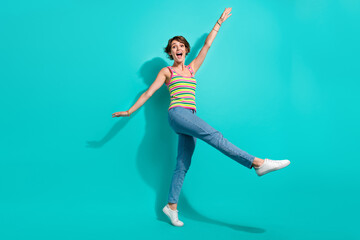 Sticker - Full body photo of carefree cheerful lady good mood rejoice enjoy dancing isolated on teal color background