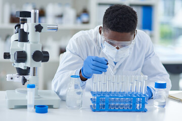 Poster - Science, test tubes and black man in laboratory, research and experiment with medical equipment. African person, employee and scientist with healthcare and education for forensics and investigation