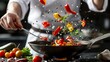 A chef tosses fresh vegetables into a sizzling pan, creating a mouthwatering splash of color and aroma in the kitchen.