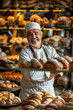 Caucasian mature man work on bakery make bread and sale