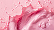 Splash of pink milky liquid similar to smoothie, yogurt or cream, cut out