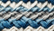 Tessuto a maglia intrecciato, texture di maglione di lana blu e bianco 