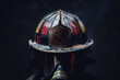 A close-up of a worn firefighter helmet against a dark background, showing signs of use and resilience.