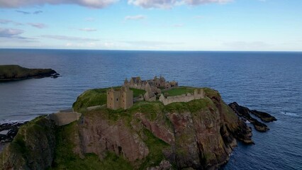 Wall Mural - orbit around old castle and buildings on scottish cliff top. dunnottar castle, stonehaven.