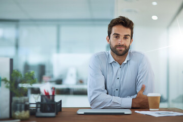 Poster - Businessman, portrait and desk with coffee, laptop and confidence for work, job and career. Business consultant, tech and face in office for company, investment and networking or growth in Spain