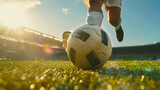 Fototapeta Londyn - Epic feet of soccer player step on soccer ball for kick off in sunny stadium