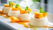An elegant dessert presentation of Thai coconut milk pudding, garnished with mango, epitomizing the delicate balance of Thai sweets.