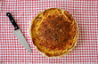 savoury quiche pie on vintage checkered cloth