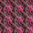pink sprinkles and icing on a brown chocolate icing background, repeatable seamless background tile
