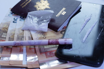 cocaïne , passport and banknotes , international drug traffic concept