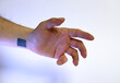 caucasian hand doing communication gesture