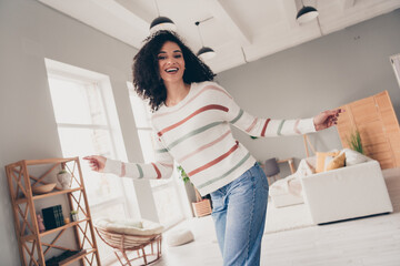 Sticker - Photo of adorable carefree lady dressed striped pullover having fun indoors apartment room