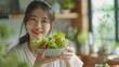 Diet and dieting, enjoy eat. Healthy woman hold salad food and feeling happy. Beauty slim female body achieves weight loss goal for healthy life, crazy about thinness, thin waist, nutritionist