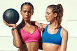 © peopleimages.com - Medicine ball, outdoor and exercise for women, portrait and friends in gym, workout and fitness for body. Sports, athlete and person with strength, proud and wellness of training, team and muscle