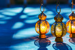 Islamic background with golden lanterns and shadows from moonlight for Eid greeting card with whitespace and blue theme. Eid and ramadan concept