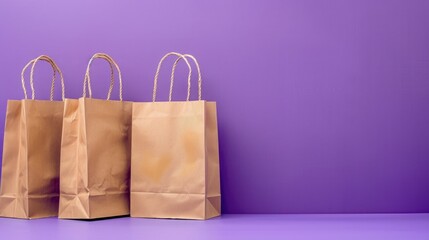 Aufkleber - Three brown paper bags on a purple surface. Suitable for retail or shopping concepts