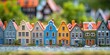 Miniature houses lined up on a city street, suitable for various design projects