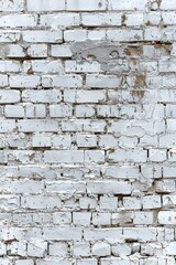 Poster - A white brick wall with peeling paint. Suitable for backgrounds and textures