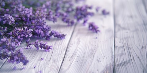 Canvas Print - A bunch of purple flowers on a wooden table, suitable for various occasions