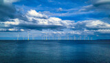Fototapeta Na sufit - Offshore Wind Turbine in a Wind farm under construction off coast of England, UK