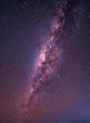 Wall Mural - landscape with milky way galaxy over night sky with stars. long exposure photograph.