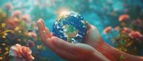 Fototapeta Uliczki - Craft a digital photorealistic image depicting two hands gently holding a tiny Earth on a strikingly vibrant blue backdrop, emphasizing the fragility and importance of our planet