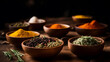 Spices and herbs in bowls on wooden table, selective focus.
