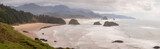 Fototapeta Most - View of Haystack Rock from Ecola State Park. Known for some of the best views on the Oregon Coast and Haystack Rock, Ecola State Park is an ideal spot to watch enormous storm waves roll in.
