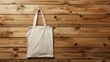 Stylish Beige Tote Bag Displayed on Rustic Wooden Wall Generative AI