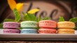 Assorted Colorful Macaron Cookies on a Platter, Perfect Treats for Elegant Desserts