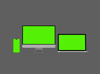 Render of desktop, laptop and smartphone with greenscreen on a dark background