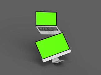 3d render of desktop and laptop with green screen on a dark background