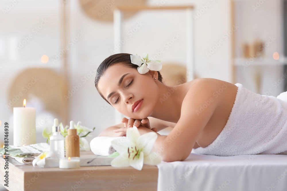 Young woman relaxing in spa salon, closeup
