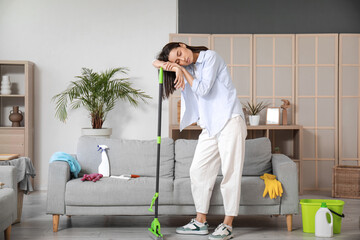 Sticker - Tired young woman with floor mop in living room