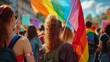 couple of women in an LGBT march with flags representing the gay and lesbian group or community