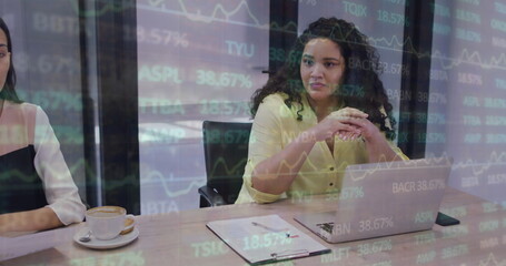 Poster - Diverse team with a biracial leader reviews business papers