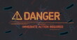 Sign says DANGER - ACT NOW amid bacteria & DNA