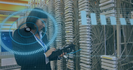 Poster - A middle-aged Caucasian woman is working on network equipment